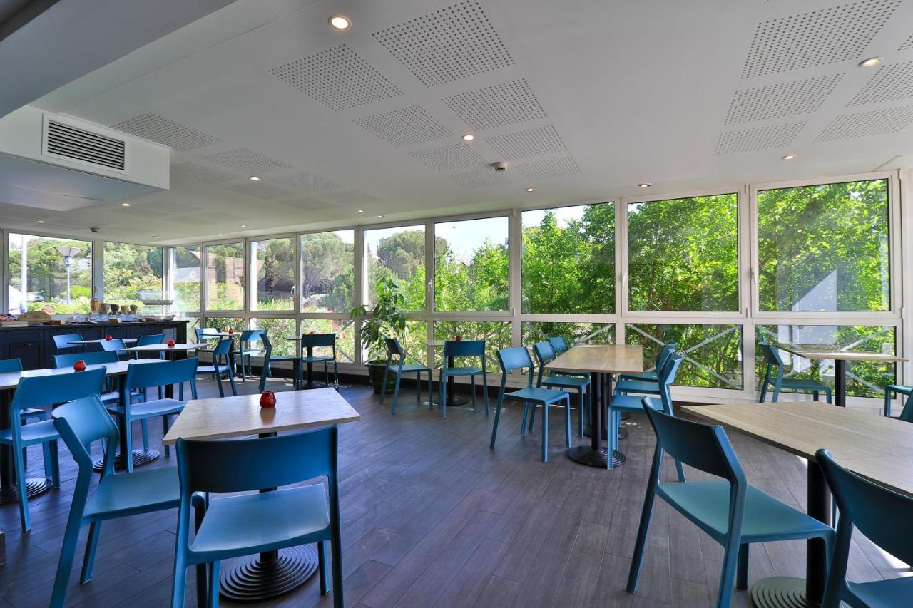 Hotel Restaurant Kyriad Frejus Exterior photo