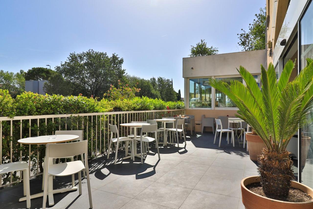Hotel Restaurant Kyriad Frejus Exterior photo